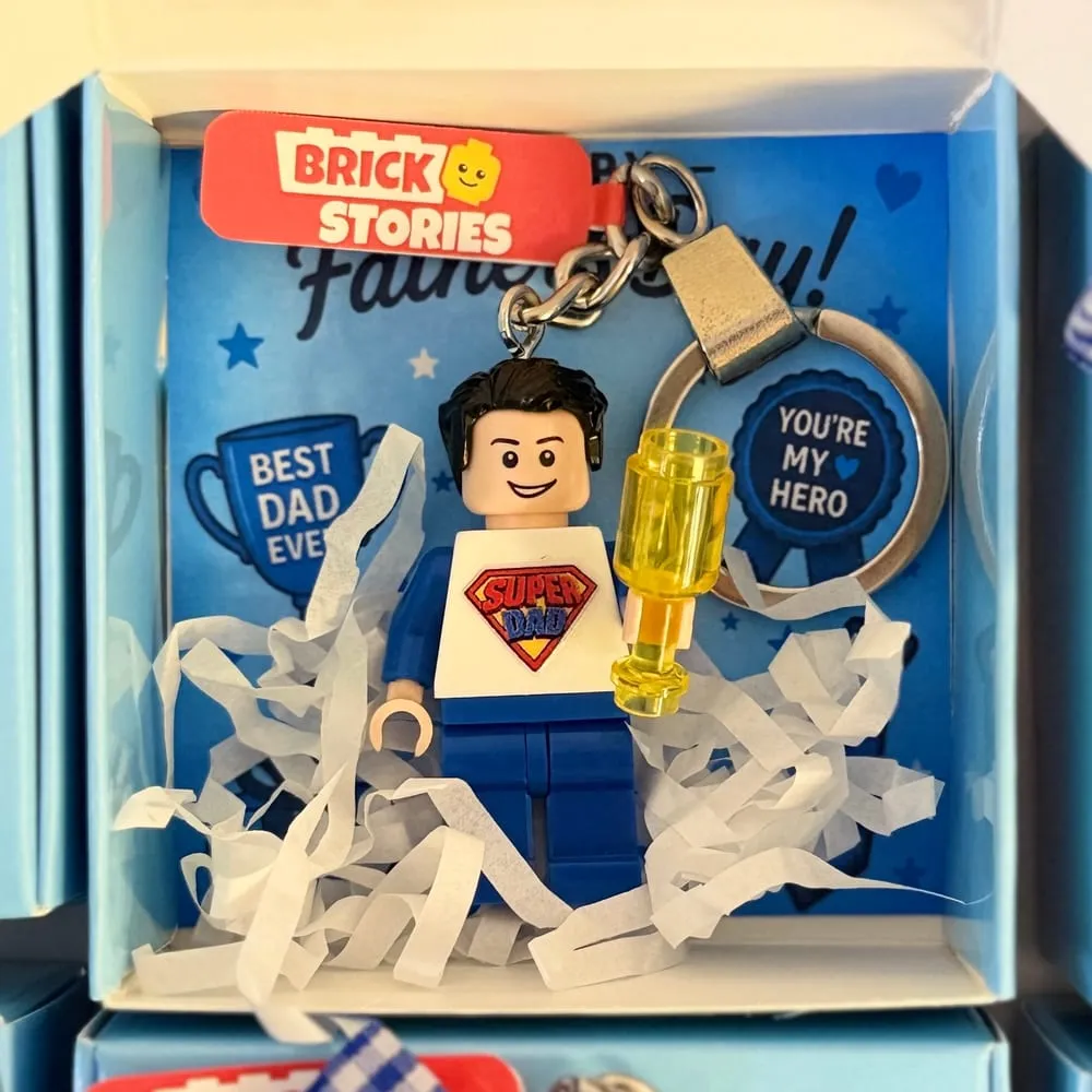 A Super Dad mini figure keychain in a Father’s Day gift box